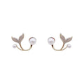 Boucles d’oreilles dorées à détail perlé